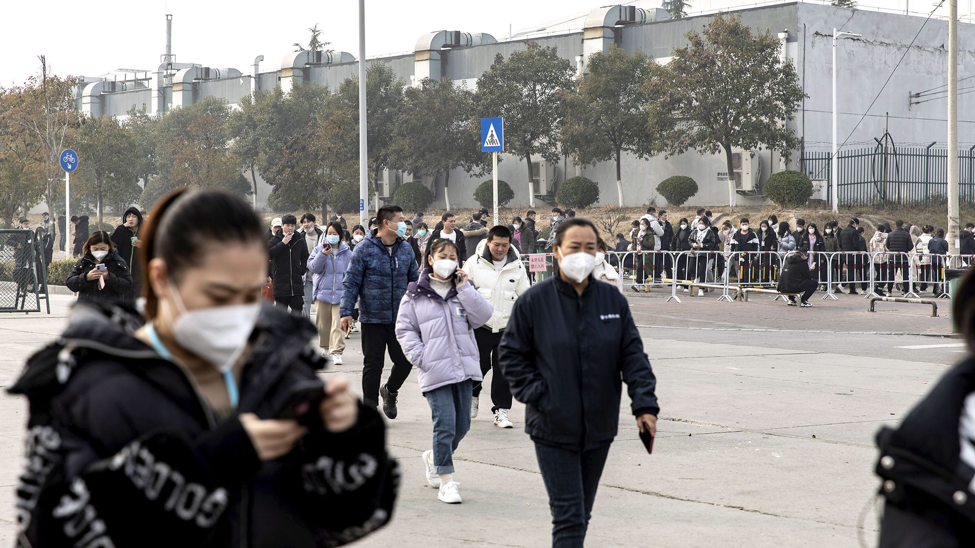 Employees during lunch hours at a Foxconn Technology Group plant in Zhengzhou, Henan province, China.