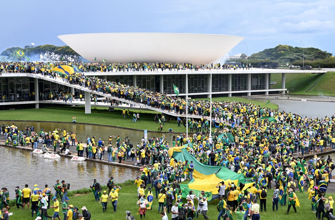 Supporters of Brazil's former President Jair Bolsonaro protest against the inauguration of President Luiz Inacio Lula da Silva in Brasilia on January 8, 2023.