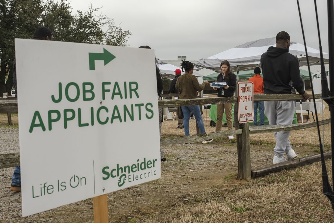 Job seekers check-in to a job fair at a Schneider Electric manufacturing facility in Hopkins, South Carolina, in January 2023.