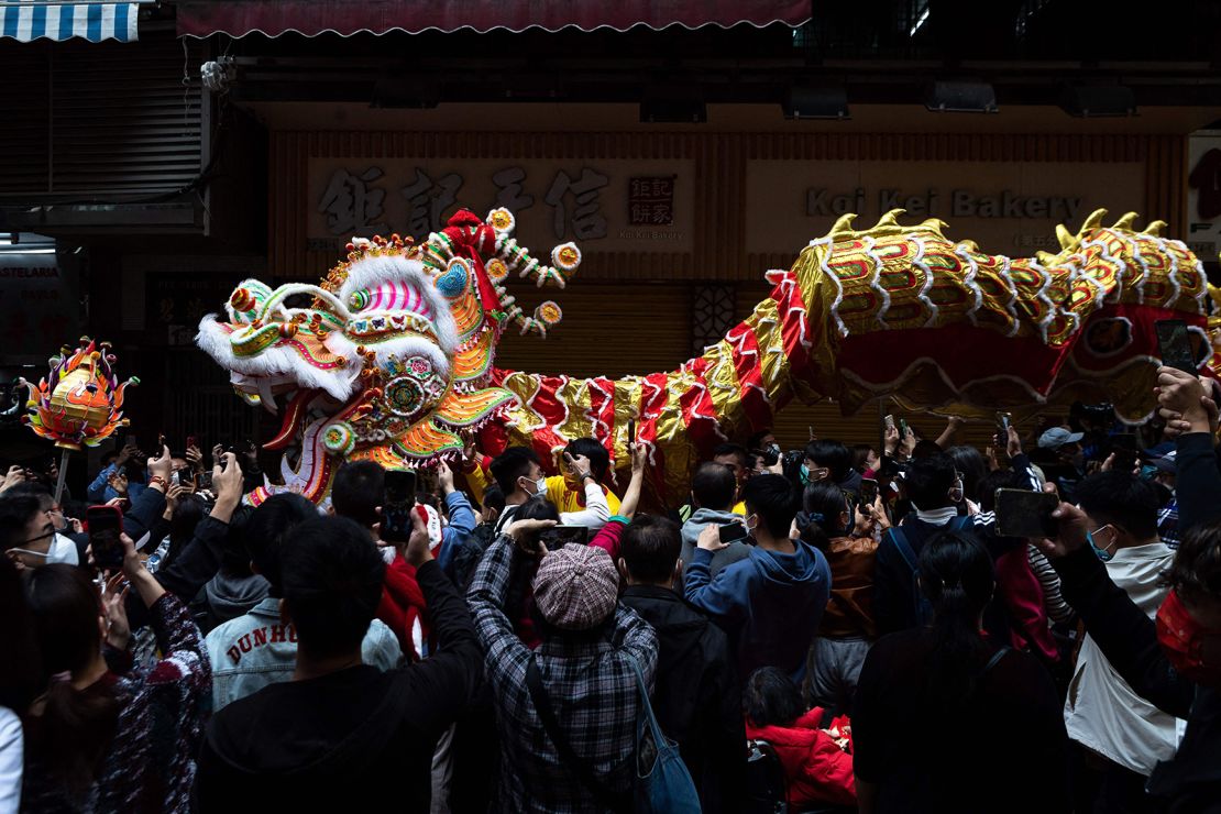 A 238 mter-long dragon dance is performed during celebrations on the first day of the Chinese lunar new year in Macau on January 22, 2023.