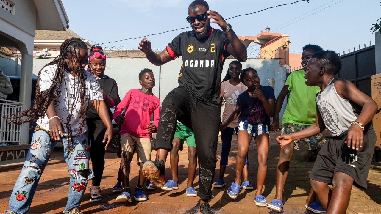 Members of Ghetto Kids, a prominent dance group in Uganda rehearse a dance routine at Big Talent Entertainment studio during a music video dance rehearsal with Ugandan musician Edrisah Musuuza, also known as Eddy Kenzo (C), in Makindye, a suburb in Kampala, Uganda, on January 20, 2023. - Orphaned and homeless, Eddy Kenzo used to struggle to convince DJs to play his songs, but Uganda's first Grammy nominee says his success offers hope that even the poorest person can triumph.
Nominated for a Grammy Award for Best Global Music Performance, he says the announcement left him speechless. (Photo by BADRU KATUMBA / AFP) (Photo by BADRU KATUMBA/AFP via Getty Images)