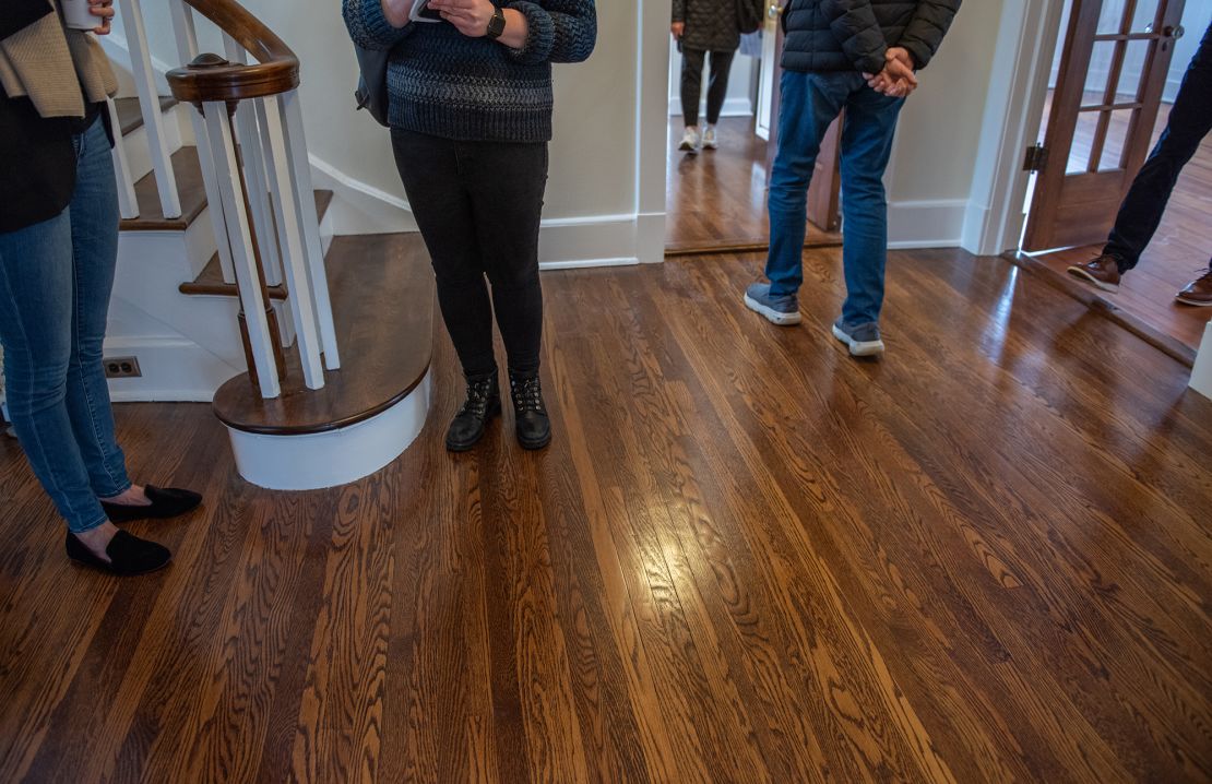 Prospective buyers attend an open house at a home for sale in Larchmont, New York, US, on Sunday, Jan. 22, 2023. Beginning on August 17, those interested in touring a house with a Realtor must first sign a buyer representation agreement.