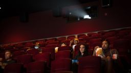 People watch movies in a newly reopened AMC River East theater on Aug, 20, 2020, in Chicago. (E. Jason Wambsgans/Chicago Tribune/Tribune News Service via Getty Images)