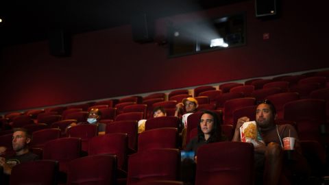 People watch movies in a newly reopened AMC River East theater on Aug, 20, 2020, in Chicago. (E. Jason Wambsgans/Chicago Tribune/Tribune News Service via Getty Images)