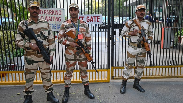 Police stand outside the BBC building where Indian tax authorities raided its office in New Delhi on February 15, 2023.