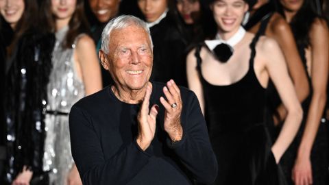 Italian fashion designer Giorgio Armani acknowledges applause during the presentation of Emporio Armani's Fall-Winter 2023-2024 Women's collection on February 23, 2023 during the Fashion Week in Milan. (Photo by Marco BERTORELLO / AFP) (Photo by MARCO BERTORELLO/AFP via Getty Images)