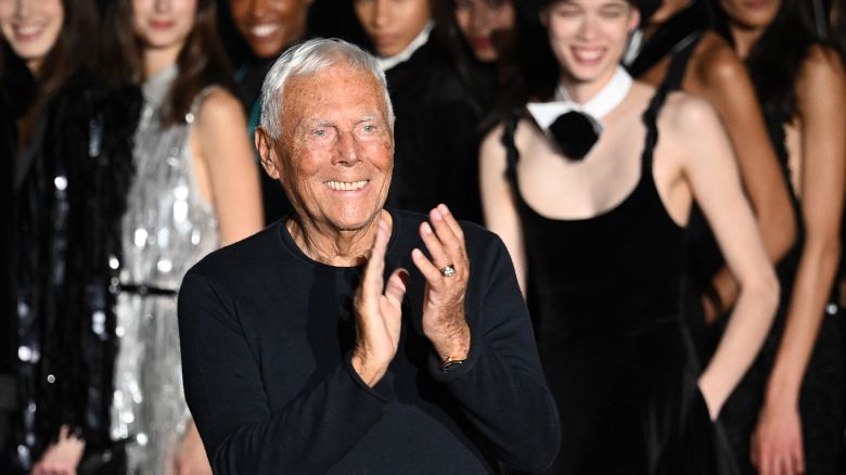 Italian fashion designer Giorgio Armani acknowledges applause during the presentation of Emporio Armani's Fall-Winter 2023-2024 Women's collection on February 23, 2023 during the Fashion Week in Milan. (Photo by Marco BERTORELLO / AFP) (Photo by MARCO BERTORELLO/AFP via Getty Images)