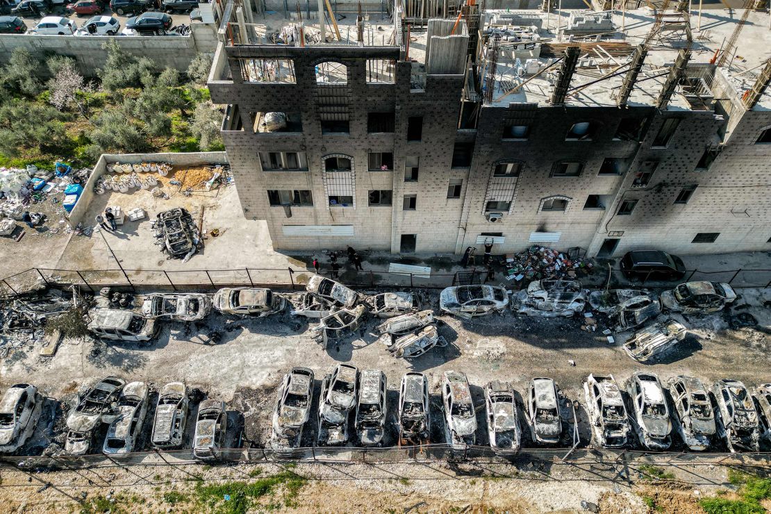An aerial view of a scrapyard where cars were torched overnight, in the Palestinian town of Huwara near Nablus in the occupied West Bank on February 27.