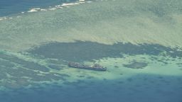An aerial view taken on March 9, 2023 shows Philippine ship BRP Sierra Madre grounded on Second Thomas Shoal in the South China Sea. - As a Philippine Coast Guard plane carrying journalists flew over the Spratly Islands in the hotly disputed South China Sea, a Chinese voice issued a stern command over the radio: "Leave immediately." (Photo by JAM STA ROSA / AFP) (Photo by JAM STA ROSA/AFP via Getty Images)