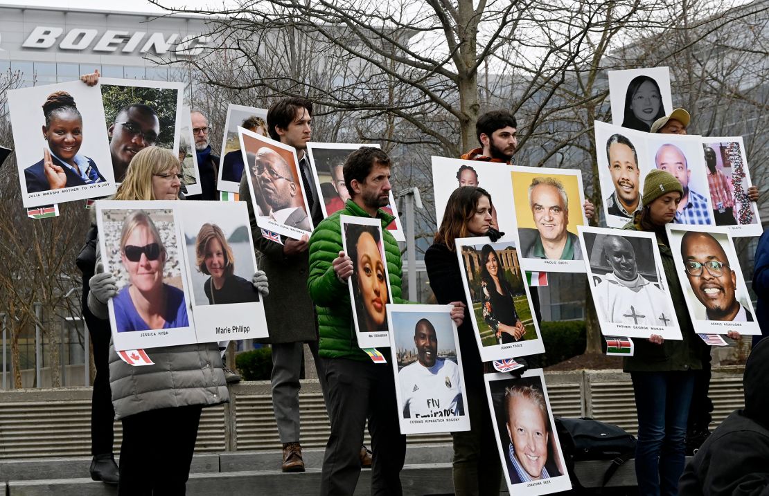 Families and friends who lost loved ones in the March 10, 2019, Boeing 737 Max crash in Ethiopia, hold a memorial protest in front of the Boeing headquarters in Arlington, Virginia, on March 10, 2023 to mark the four-year anniversary of the event.