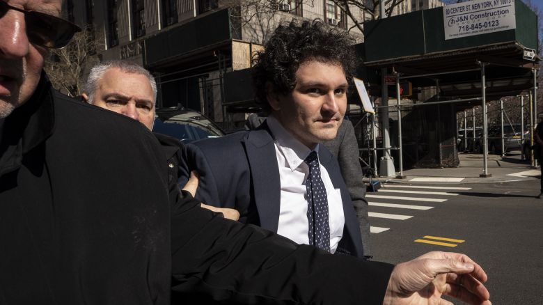 FTX founder Sam Bankman-Fried arrives for trial at Manhattan Federal Court on March 30, 2023 in New York City. Federal prosecutors added a foreign bribery charge to the list of crimes that Bankman-Fried is already facing. The indictment accuses the FTX founder of directing $40 million in bribes to Chinese government officials to unfreeze assets related to his cryptocurrency business.