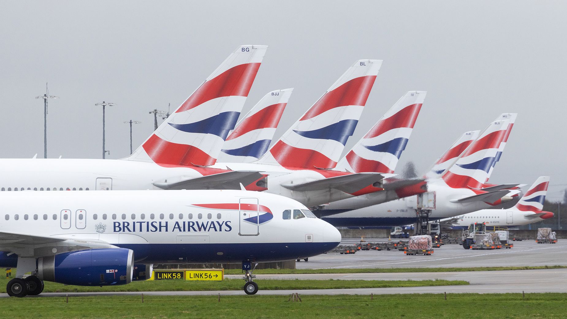 Airplanes operated by British Airways line up on the tarmac at London Heathrow Airport on Friday, March 31, 2023. Flight BA165 from this airport was on approach to Tel Aviv's Ben-Gurion International Airport when it was called back to London.