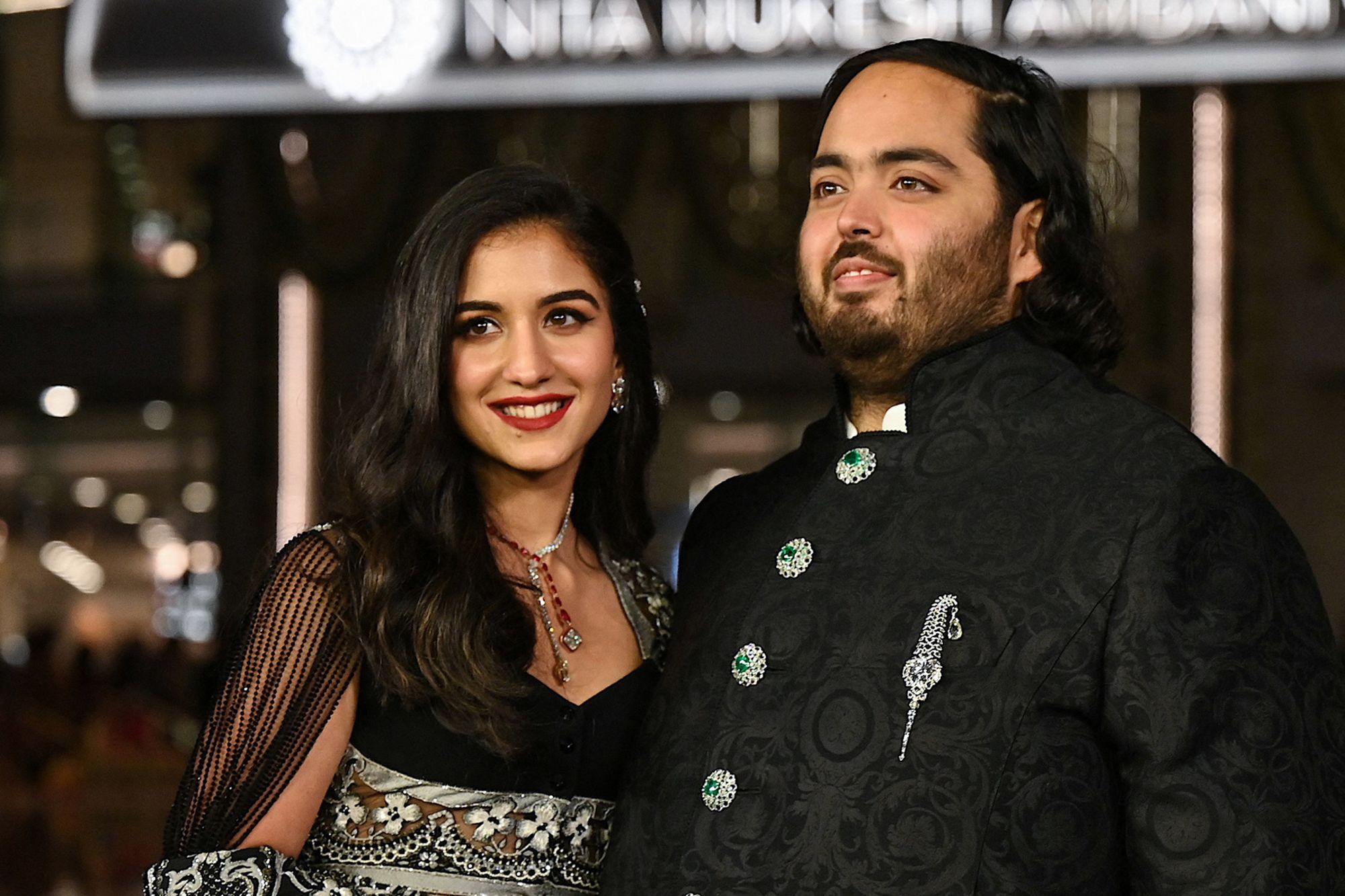 Anant Ambani and Radhika Merchant pose for pictures during the inauguration of the Nita Mukesh Ambani Cultural Centre at the Jio World Centre in Mumbai in 2023.