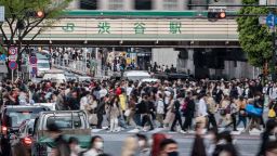 Crowds of people cross the street at Shibuya Crossing, one of the busiest intersections in the world, in the Shibuya district of Tokyo on April 5, 2023. - Nearly 1.5 million working-age people in Japan are social recluses, according to a new government survey, with a fifth citing the Covid-19 pandemic as the main reason for their withdrawal. (Photo by Richard A. Brooks / AFP) (Photo by RICHARD A. BROOKS/AFP via Getty Images)
