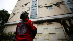 MEXICO CITY, MEXICO - JUNE 23: An urban search and rescue rescuer looks a damage bulding since the 2017 earthquake on June 23, 2020 in Mexico City, Mexico. According to the National Seismological Service a 7.5 magnitude earthquake was registered on Tuesday in Mexico City and in various areas of the country. (Photo by Manuel Velasquez/Getty Images)