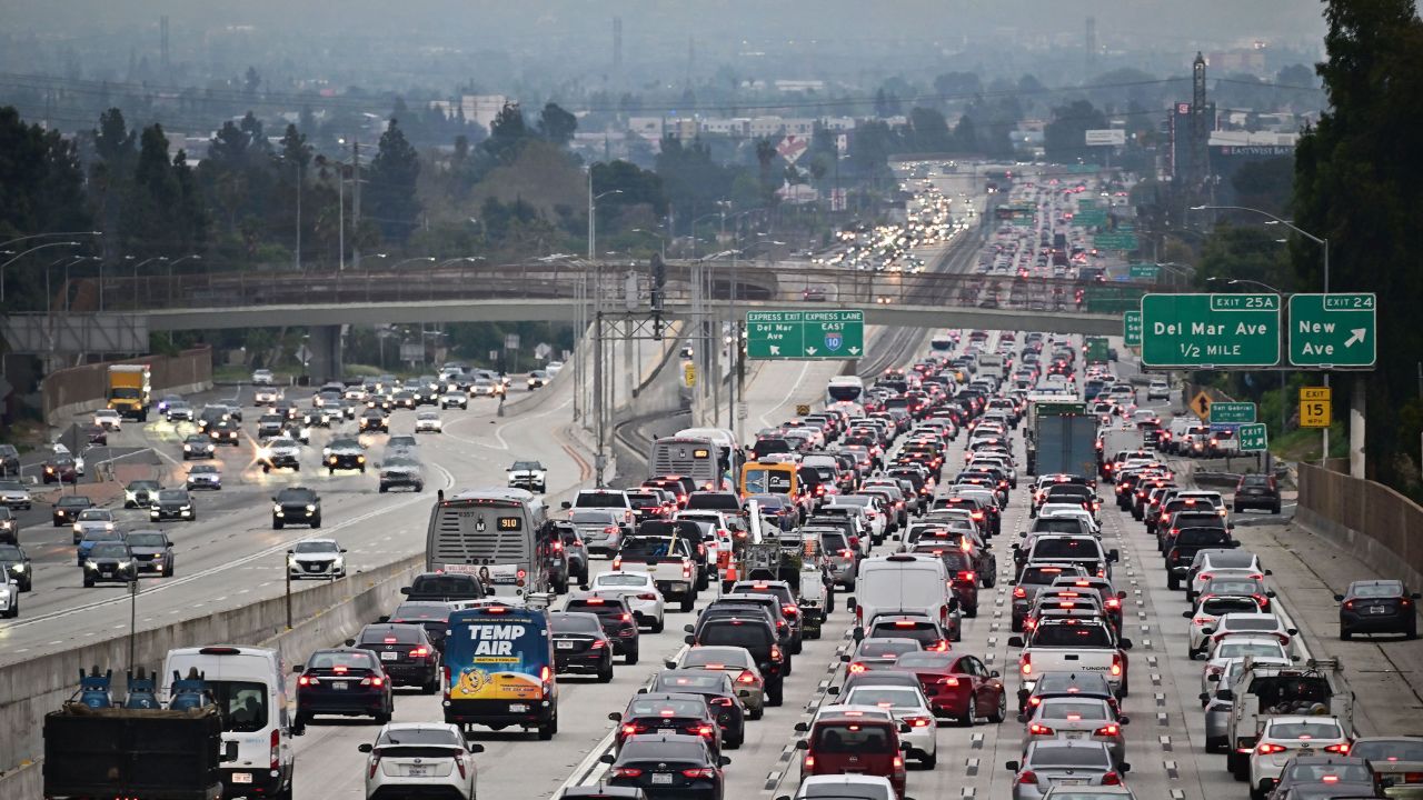Traffic on a Los Angeles freeway during the evening rush hour commute on April 12, 2023 in Alhambra, California. - US President Joe Biden's administration unveiled new proposed auto emissions rules, aiming to accelerate the electric vehicle transition with a target of two-thirds of the new US car market by 2032. (Photo by Frederic J. BROWN / AFP) (Photo by FREDERIC J. BROWN/AFP via Getty Images)