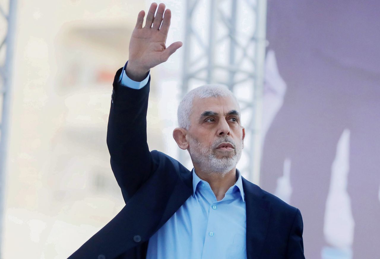 GAZA, PALESTINE - 2023/04/14: Yahya Sinwar, head of the Palestinian Islamic movement Hamas in the Gaza Strip, waves his hand to the crowd during the celebration of International Quds Day in Gaza City. The chief of the Palestinian Islamist Hamas movement in Gaza, Yahya Sinwar delivered a historic address to the Palestinian people of Gaza, telling them to stick up to the fighting against Israel in a speech that reflected his country's support for the territory's ruling Hamas militant group. Al-Quds (Jerusalem) Day is a commemoration day in support of the Palestinian people held annually on the last Friday of the Muslim fasting month of Ramadan by an initiative started by the late founder of the Islamic Republic in Iran. (Photo by Yousef Masoud/SOPA Images/LightRocket via Getty Images)