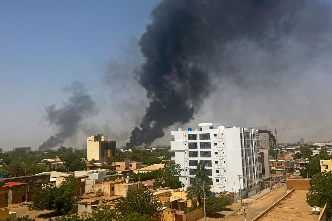 Smoke billows above residential buildings in Khartoum, during fighting in April 2023.