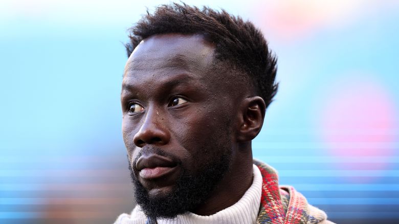 MANCHESTER, ENGLAND - APRIL 26: Former Manchester City and Arsenal player Bacary Sagna working for BT Sport Television as a pundit during the Premier League match between Manchester City and Arsenal FC at Etihad Stadium on April 26, 2023 in Manchester, United Kingdom.