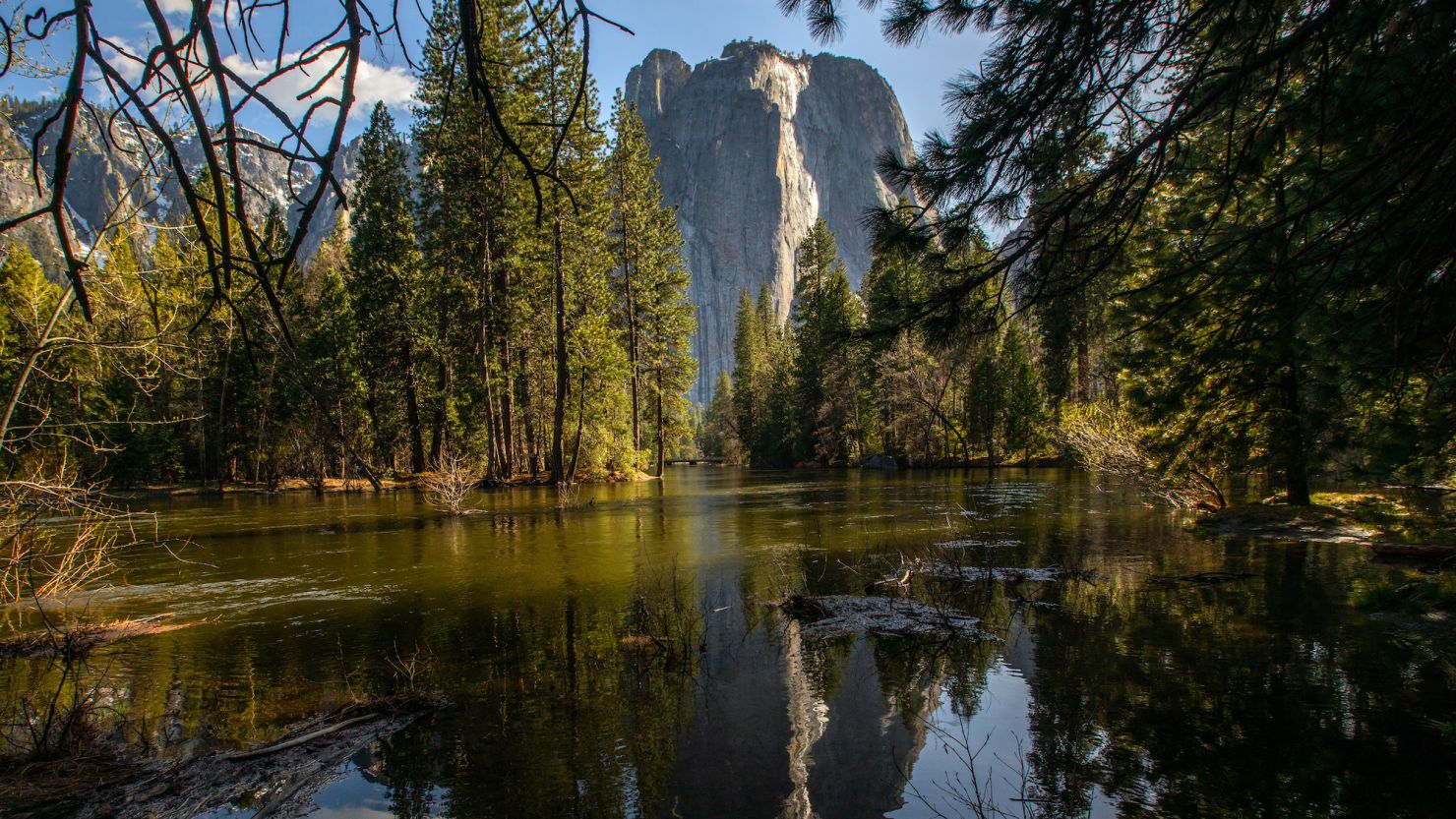 The Merced River is seen on the rise on April 27, 2023, inside Yosemite National Park. Weather is more favorable this year for the free entry day on Saturday.