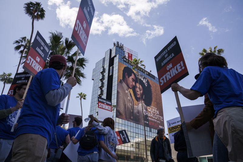 Writers Guild of America members and supporters on a picket line outside the Netflix Inc. offices