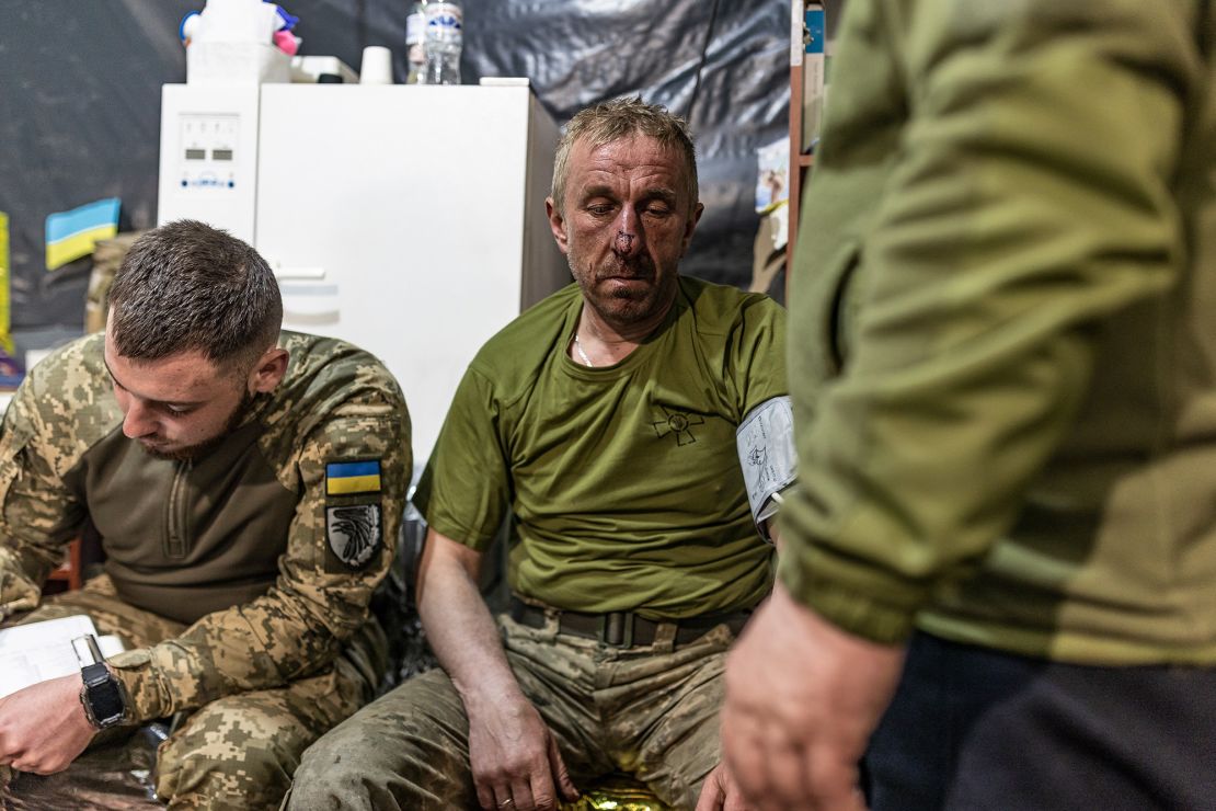 Ukrainian army medics treat wounded soldiers at a stabilisation point near Bakhmut frontline.
