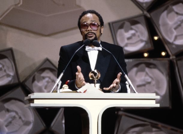 Jones speaks on stage during the Grammy Awards in 1982.