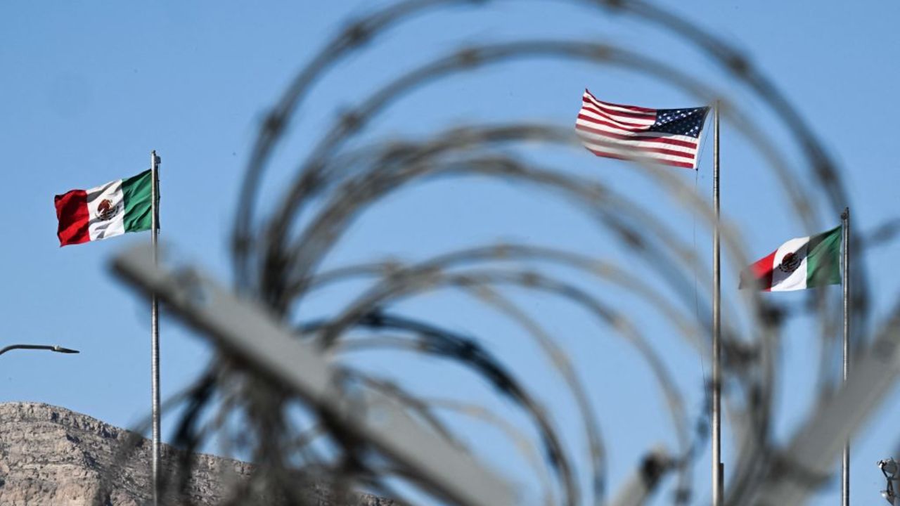 The flags of the United States and Mexico blow in the wind near US Customs and Border Protection Border Patrol Paso del Norte Port of Entry on the US-Mexico border in El Paso, Texas on May 9, 2023. The US on May 11, 2023, will officially end its 40-month Covid-19 emergency, also discarding the Title 42 law, a tool that has been used to prevent millions of migrants from entering the country. (Photo by Patrick T. Fallon / AFP) (Photo by PATRICK T. FALLON/AFP via Getty Images)