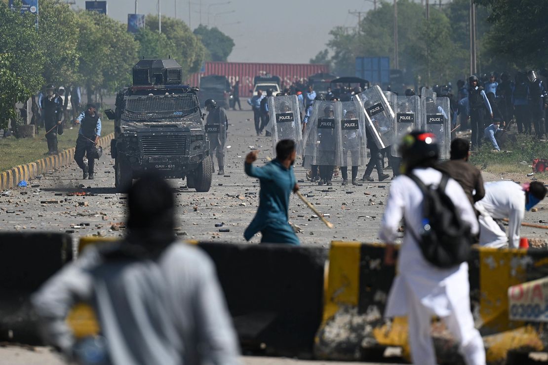 Supporters of Khan clash with police during a protest in Islamabad on May 10, 2023.