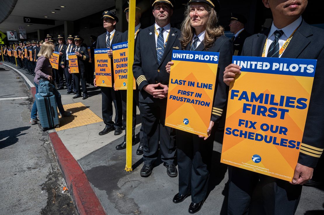 United Airlines pilots hold an informational picket outside San Francisco International Airport on May 12, 2023. While the union never got close to a strike it was able to win pay increases of more than 40% for members over the life of its new contract.