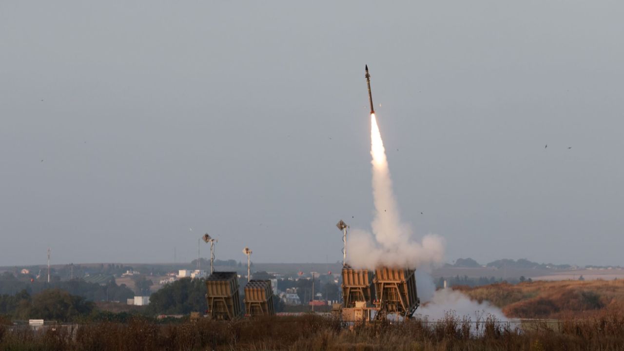 Israeli forces fire rockets from their Iron Dome defence system near the southern city of Sderot to intercept rockets launched from the Gaza Strip, on May 13, 2023. Israeli air strikes battered Gaza again on May 13 in response to rocket fire from militants as deadly fighting resumed after a night of relative calm, despite efforts to secure a truce. (Photo by Menahem KAHANA / AFP) (Photo by MENAHEM KAHANA/AFP via Getty Images)
