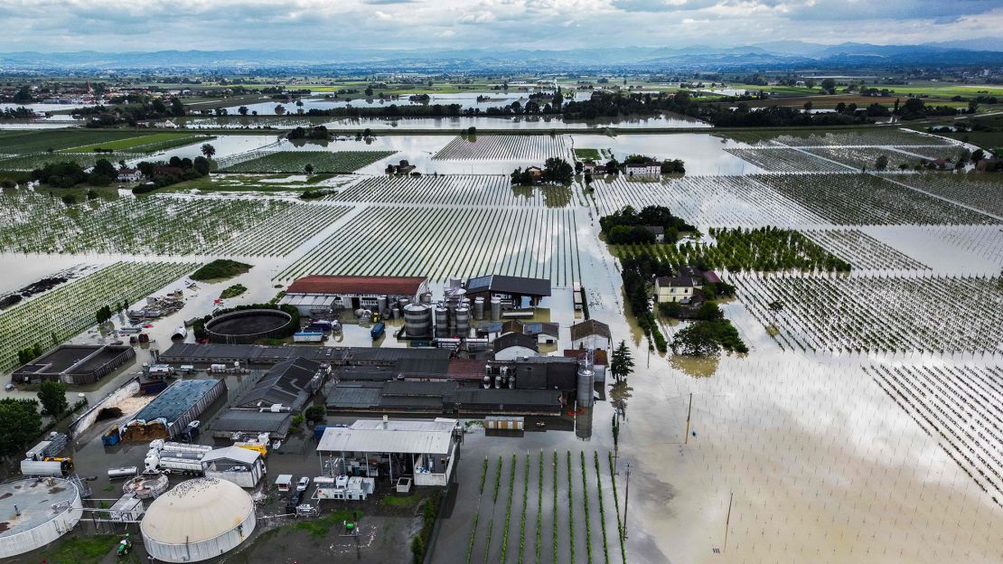 An aerial view shows a flooded pig farm and surrounding fields in Lugo, Italy on May 18, 2023, after heavy rains caused flooding.
