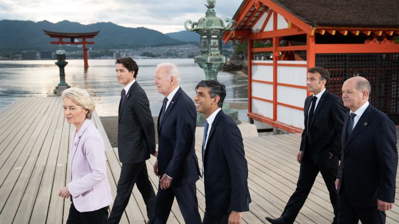 HIROSHIMA, JAPAN - MAY 19: G7 leaders (left to right) European Commission President Ursula von der Leyen, Canada's Prime Minister Justin Trudeau, US President Joe Biden, UK Prime Minister Rishi Sunak, French President Emmanuel Macron and German Chancellor Olaf Scholz arrive for the family photo at the Itsukushima Shrine during the G7 Summit on May 19, 2023 in Hiroshima, Japan. (Photo by Stefan Rousseau - Pool/Getty Images)