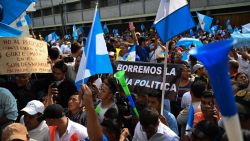 Supporters of Guatemalan presidential candidate for the Citizen Prosperity party, Carlos Pineda, gather outside the Constitutional Court in Guatemala City on May 20, 2023. A court in Guatemala provisionally suspended on Friday the presidential candidacy of businessman Carlos Pineda, a leading contender for the country's top job in elections slated for next month. (Photo by Johan ORDONEZ / AFP) (Photo by JOHAN ORDONEZ/AFP via Getty Images)