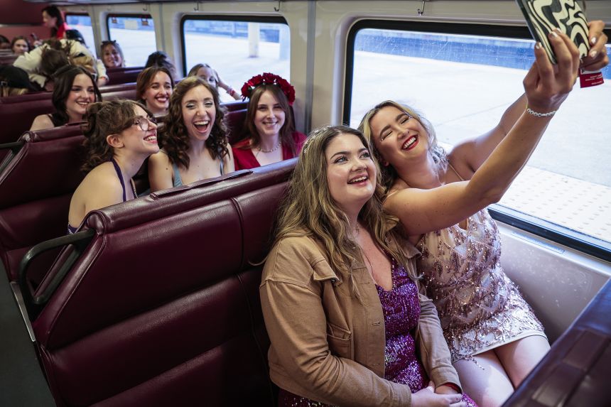 Taylor Swift fans ride the commuter line to Gillette Stadium for a weekend concert on May 19, 2023 in Boston, MA.