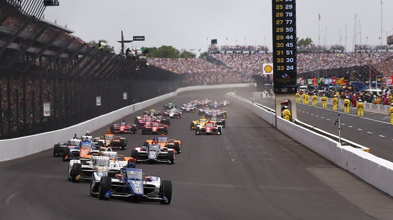INDIANAPOLIS, IN - MAY 28: Alex Palou (#10 Chip Ganassi Racing) leads the field into turn one to start the race during the NTT IndyCar Series 107th Indianapolis 500 on May 28, 2023 at the Indianapolis Motor Speedway in Indianapolis, IN.  (Photo by Jeffrey Brown/Icon Sportswire via Getty Images)