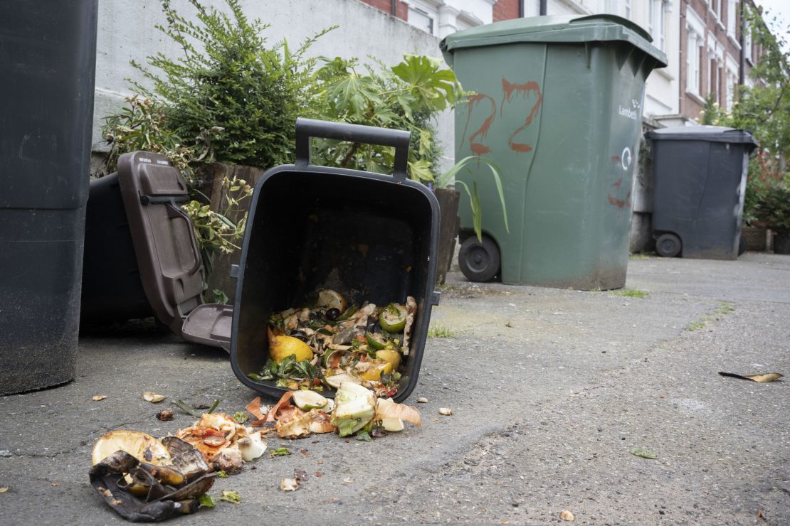 Food waste spills across a street in London.