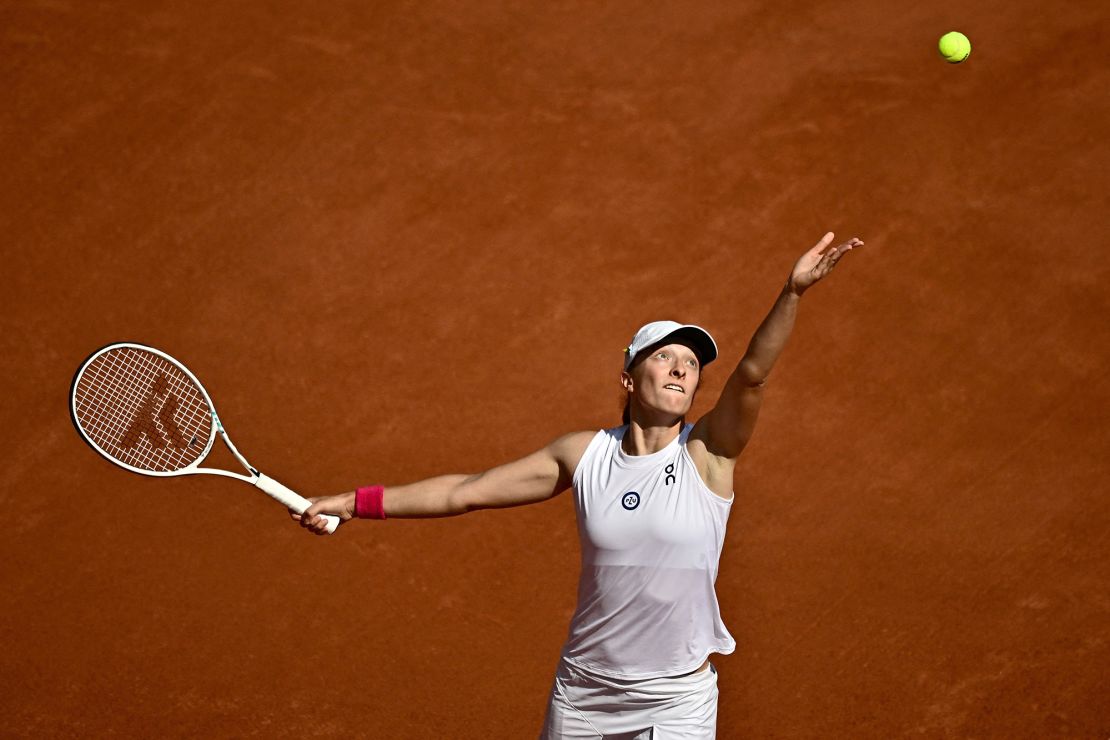 ?wi?tek serves against Karolína Muchová during last year's final at Roland Garros.