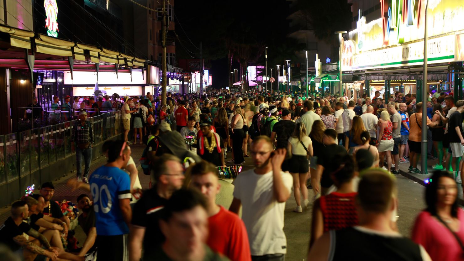 Crowds gather on a June 2023 evening on a busy street in Palma de Mallorca, Spain.
