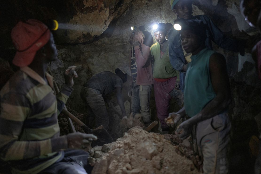 Miners work at a coltan mine, near Rubaya, in DR Congo's North Kivu region, on April 12, 2023.