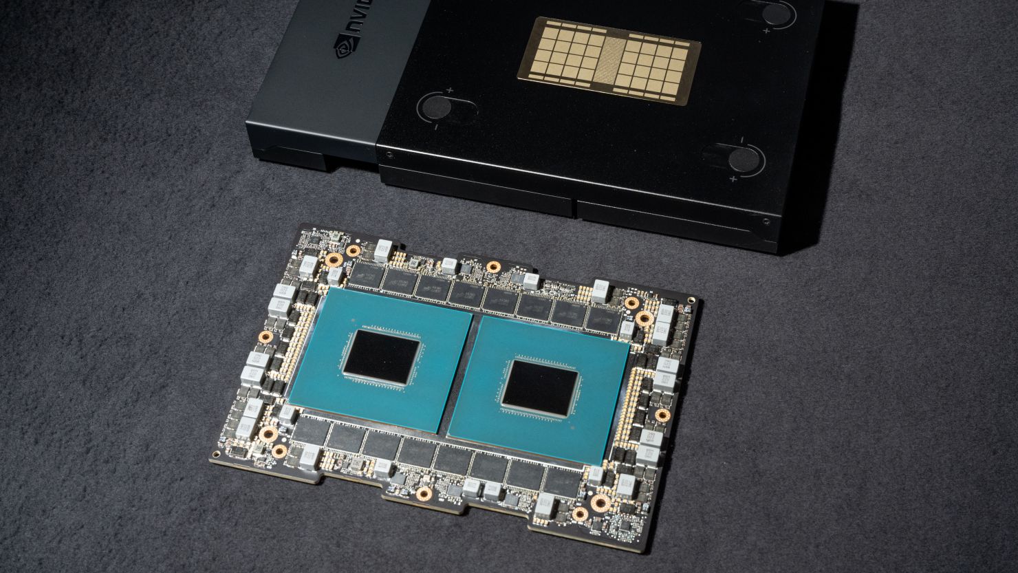 A Nvidia Grace CPU Superchip, bottom, and Grace-Grace module arranged at the company's headquarters in Santa Clara, California, US, on Monday, June 5, 2023.