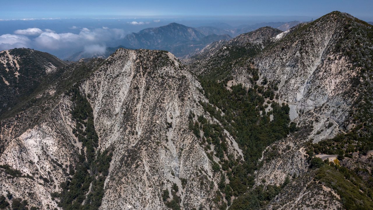 PASADENA, CALIFORNIA - JUNE 23: In an aerial view, Mount Markham, Eaton Canyon and San Gabriel Peak (R), in the San Gabriel Mountains within the San Gabriel Mountains National Monument and Angeles National Forest, are seen on June 23, 2023, above Pasadena, California. Today, Sen. Alex Padilla, D-California, and other officials will held a news conference to announce a strategy to protect the San Gabriel Mountains and expand the existing San Gabriel Mountains National Monument. As One of three bills within the Protecting Unique and Beautiful Landscapes by Investing in California (PUBLIC), proposed by Padilla, the San Gabriel Mountains Foothills and Rivers Protection Act would increase the size of the San Gabriel Mountains National Monument by more than 109,000 acres to include part of the western Angeles National Forest, and would create a National Recreation Area along the San Gabriel Valley foothills and the Rio Hondo and SanÂ GabrielÂ River Corridors. The project would increase public lands access for millions of people in Los Angeles County which, according to Padilla, includes one of the nation's most park-poor and densely populated regions. (Photo by David McNew/Getty Images)