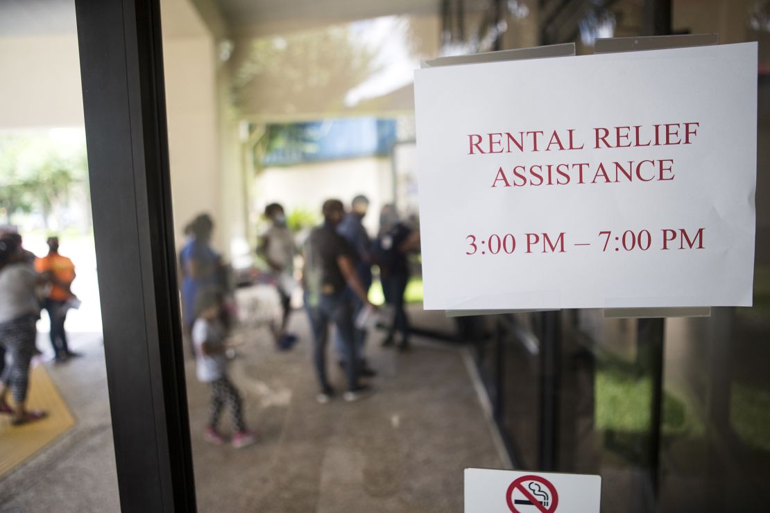 People line up to apply for help through the Houston-Harris County Emergency Rental Assistance Program at Harvest Time Church on June 30, 2021 in Houston.