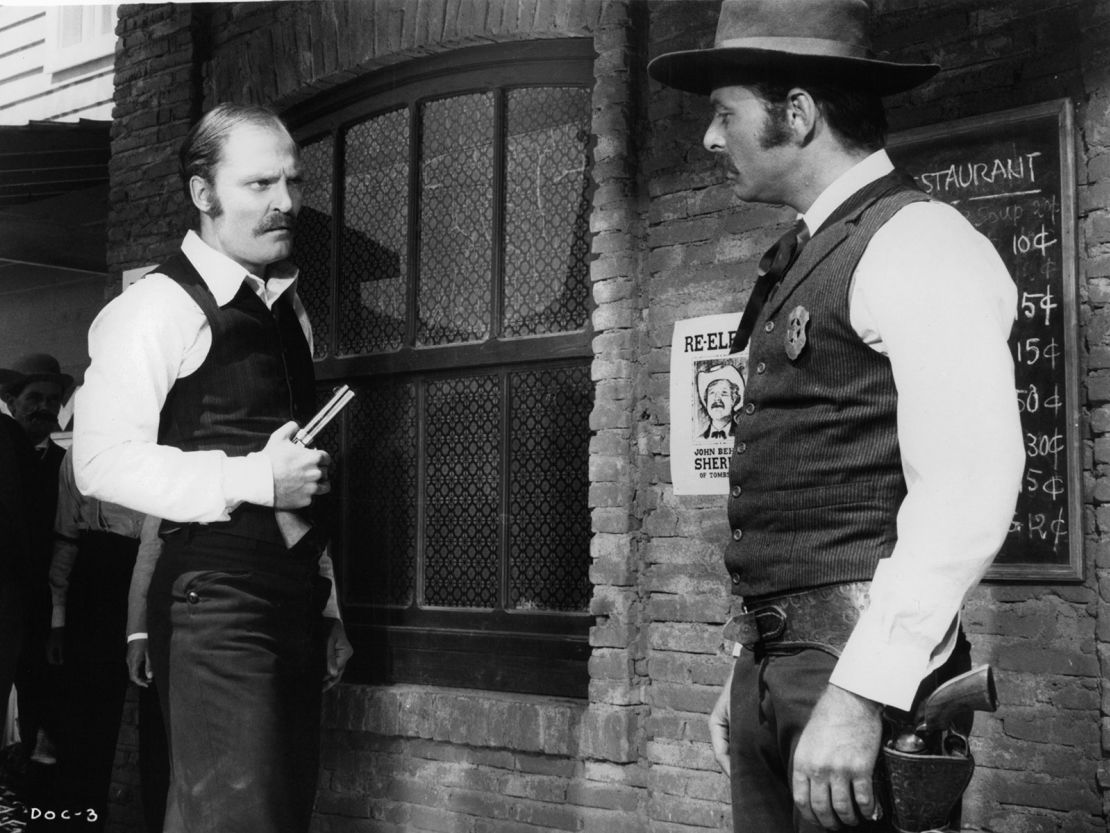 Stacy Keach and Harris Yulin outside a Saloon after a gunfight in a scene from the film 'DOC' in 1971.