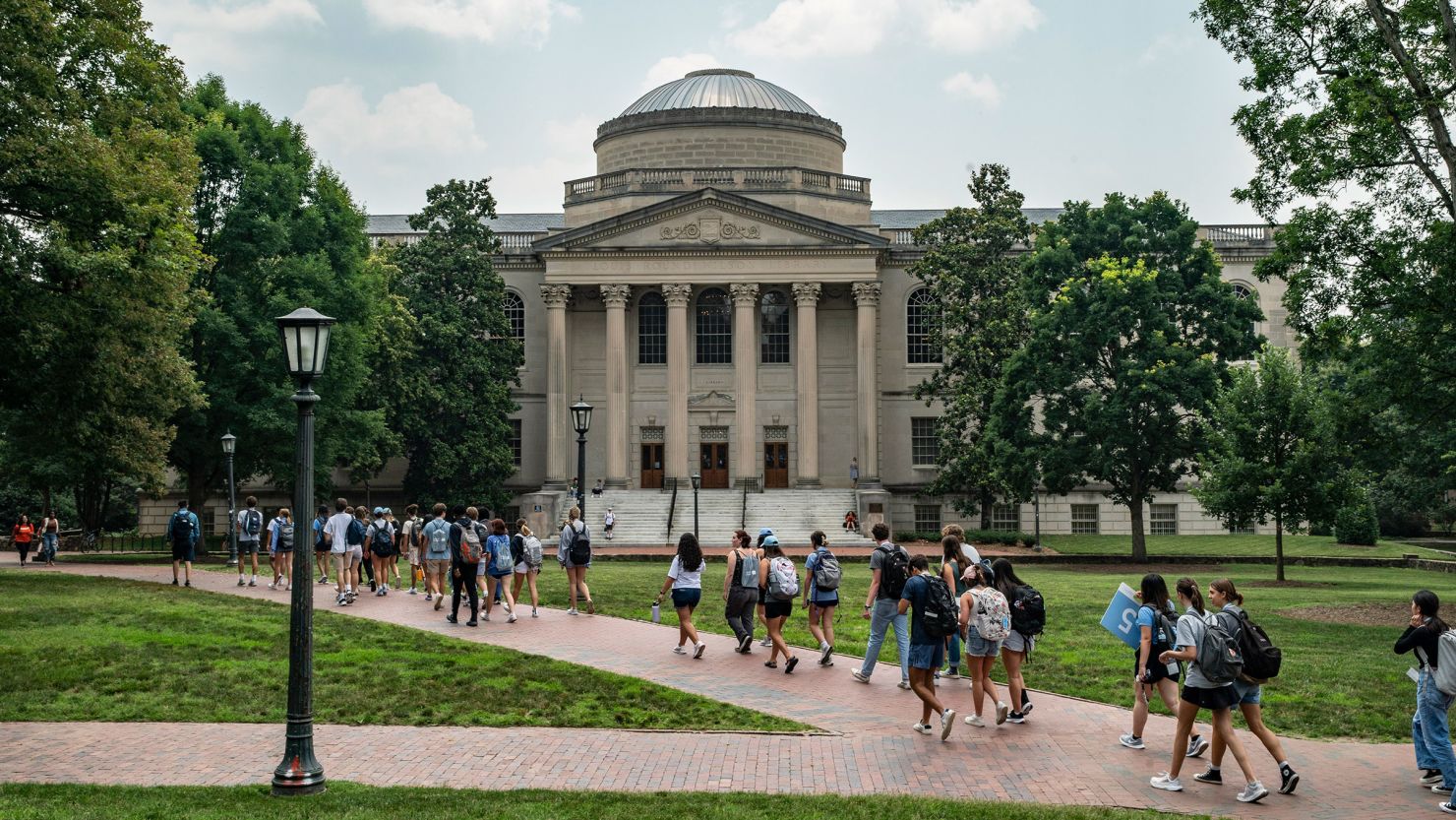 People walk on the campus of the University of North Carolina Chapel Hill on June 29, 2023, in Chapel Hill, North Carolina.