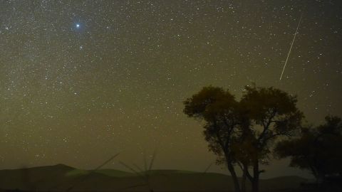BAYINGOLIN, CHINA - OCTOBER 21: The Orionid meteor shower lights up the night sky at Yuli County on October 21, 2020 in Bayingolin Mongol Autonomous Prefecture, Xinjiang Uygur Autonomous Region of China. (Photo by Xue Bing/VCG via Getty Images)