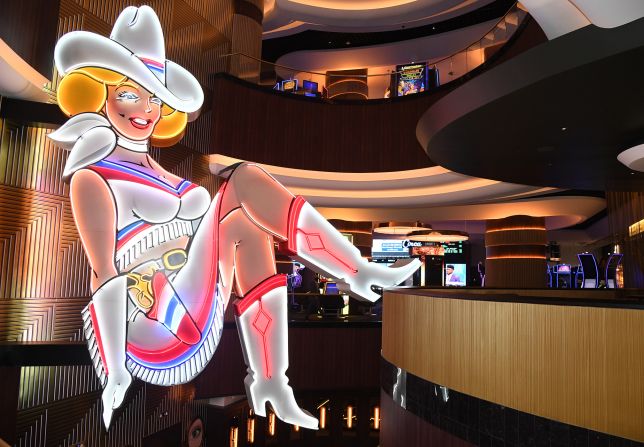 <strong>Vegas Vickie:  </strong>Inside Circa Las Vegas, visitors flock to glimpse Vegas Vickie, a 25-foot-tall neon cowgirl who overlooks a lively bar and the main casino floor. Vickie originally appeared outside on Fremont Street in 1980.