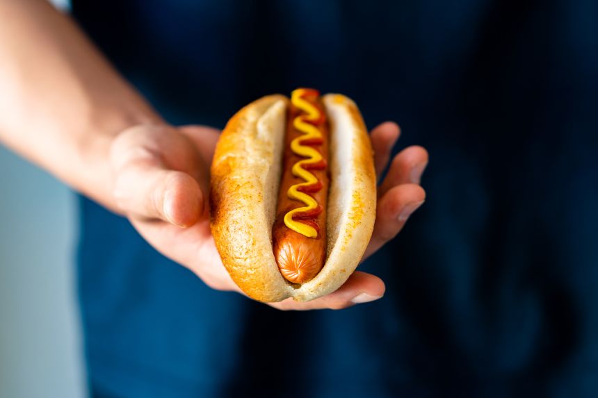 The hot dog is one serving of ultraprocessed food, and the bun made of refined grains is another.