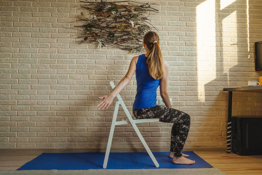 Chair yoga, such as seated twists, is traditional yoga performed while sitting in or using a chair. Regardless of age, it's great for everyone, especially those glued to their desks during the workday.