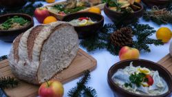 KRAKOW, POLAND - DECEMBER 20: Traditional polish Christmas dishes are pictured part of a media photo opportunity to show the food parcel ingredients for the needy people at Krakow's UNESCO listed Main Square on December 20, 2020 in Krakow, Poland. This year's, the 24th edition of the Christmas Eve for Homeless and Needy People organized by Jan Kosciuszko is taking a different shape as restrictions to tackle the coronavirus spread are ongoing. Consider to be the biggest Christmas table in Poland as been adapted to a convoy with dozens of thousands of food parcels to be delivered to associations in Krakow, that later will give away to the homeless and people in need. (Photo by Omar Marques/Getty Images)